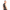 Three-quarter back view of Dark Kulture's artisan-made latex sleeveless shirt, highlighting the seamless-look tailoring
