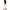 Side profile of the knee-length latex pencil skirt styled with high heels, highlighting the elegant and versatile alternative silhouette