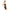 Side profile of the sleek black latex strapless mini dress from Dark Kulture, highlighting the body-contouring fit and above-knee length.